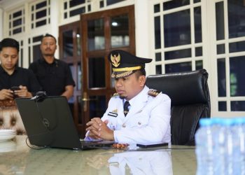 Wali Kota Parepare, Tasming Hamid, mengikuti upacara Hari Otonomi Daerah 2025 secara virtual dari Rumah Jabatan.